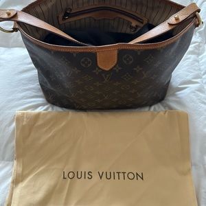 Louis Vuitton vintage bag, Tory Burch elegant leather boots
